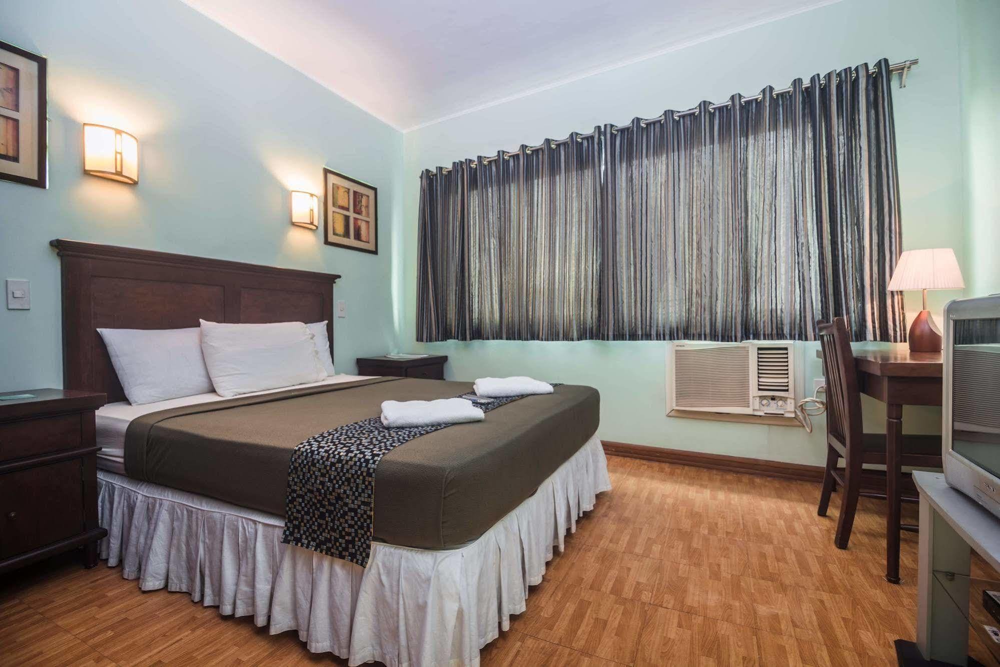 Oftana Suites Mandaue-stad Buitenkant foto